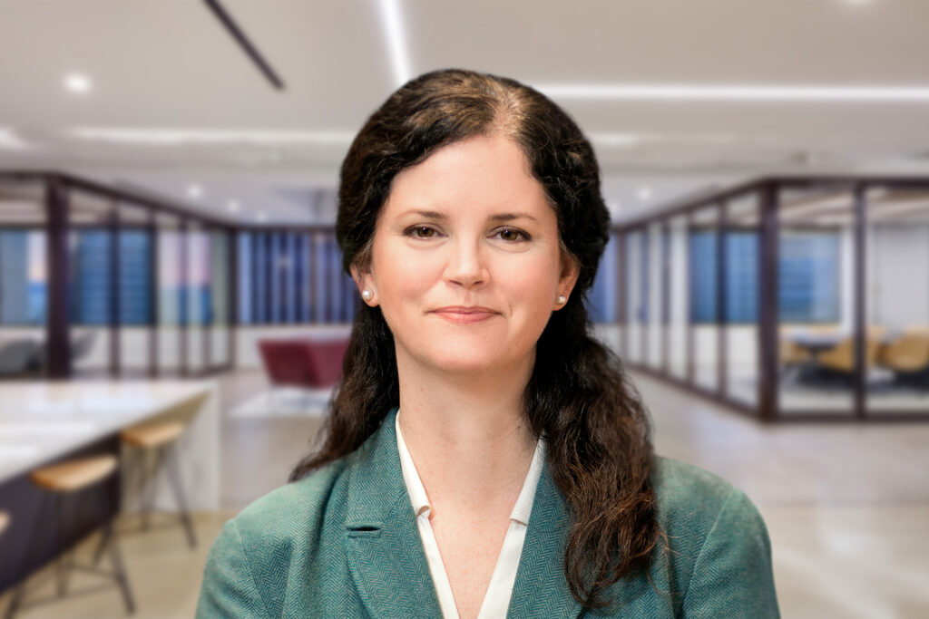 woman-with-long-hair-wearing-green-suit-jacket